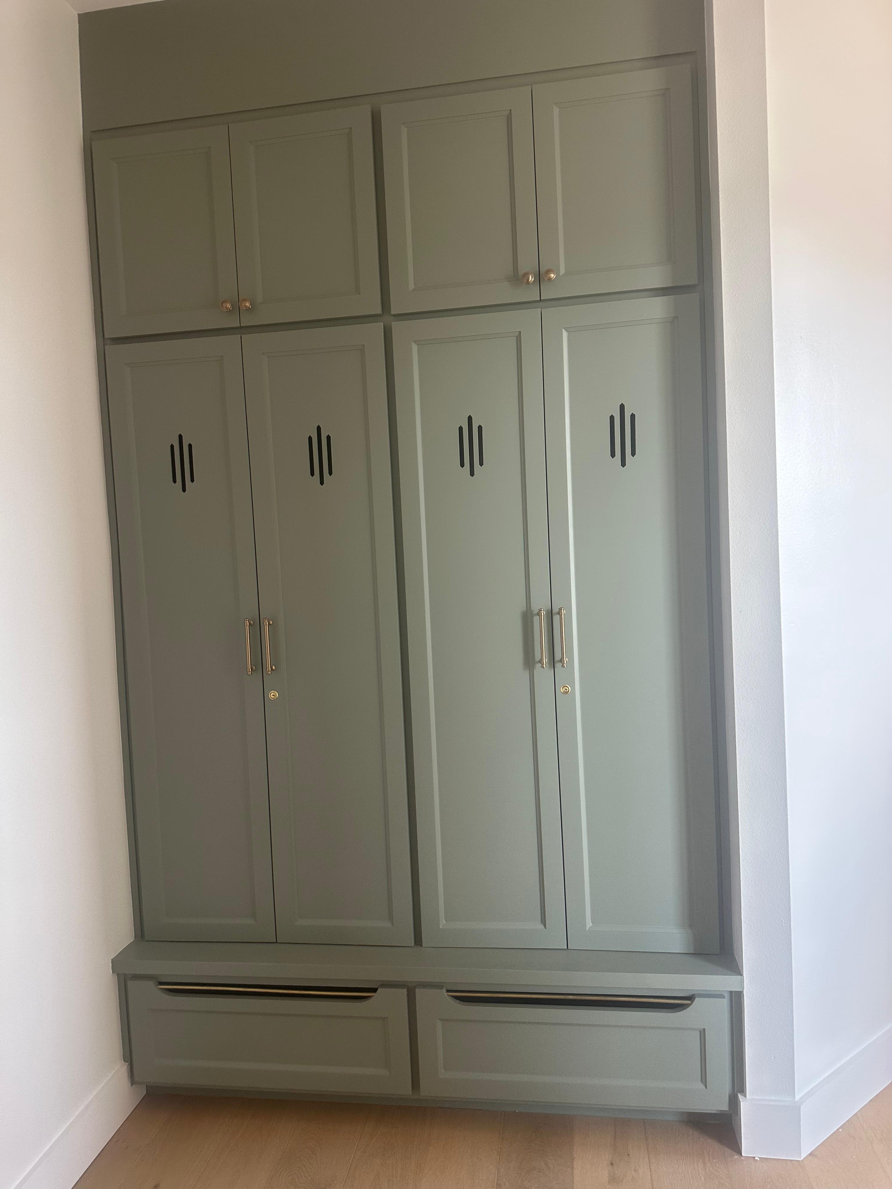 Finished fluted wood bathroom vanity with modern sconces