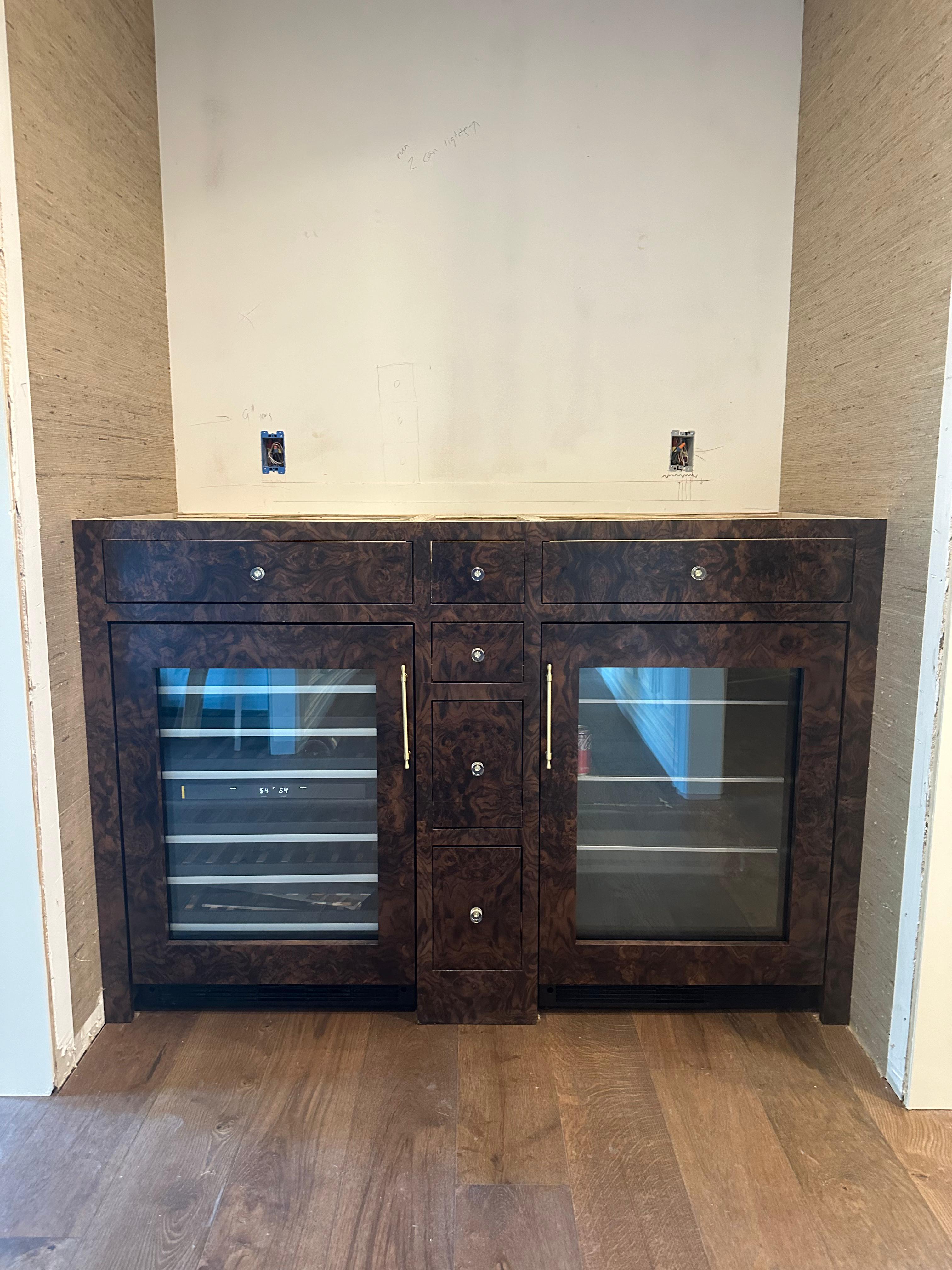 Blue-green mudroom lockers with bottom drawers